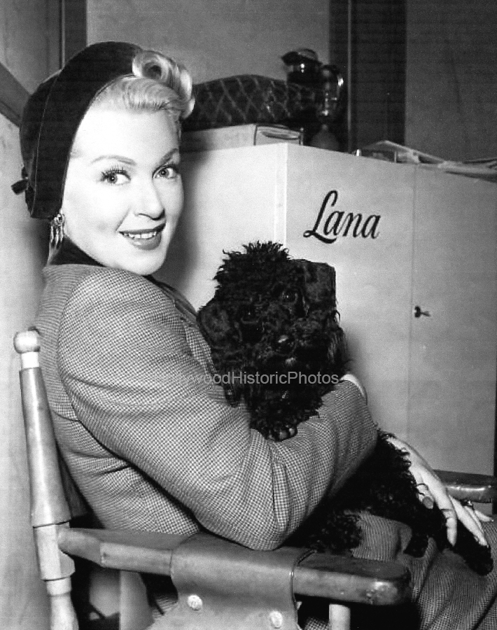Lana Turner 1946 With her pet black French poodle wm.jpg